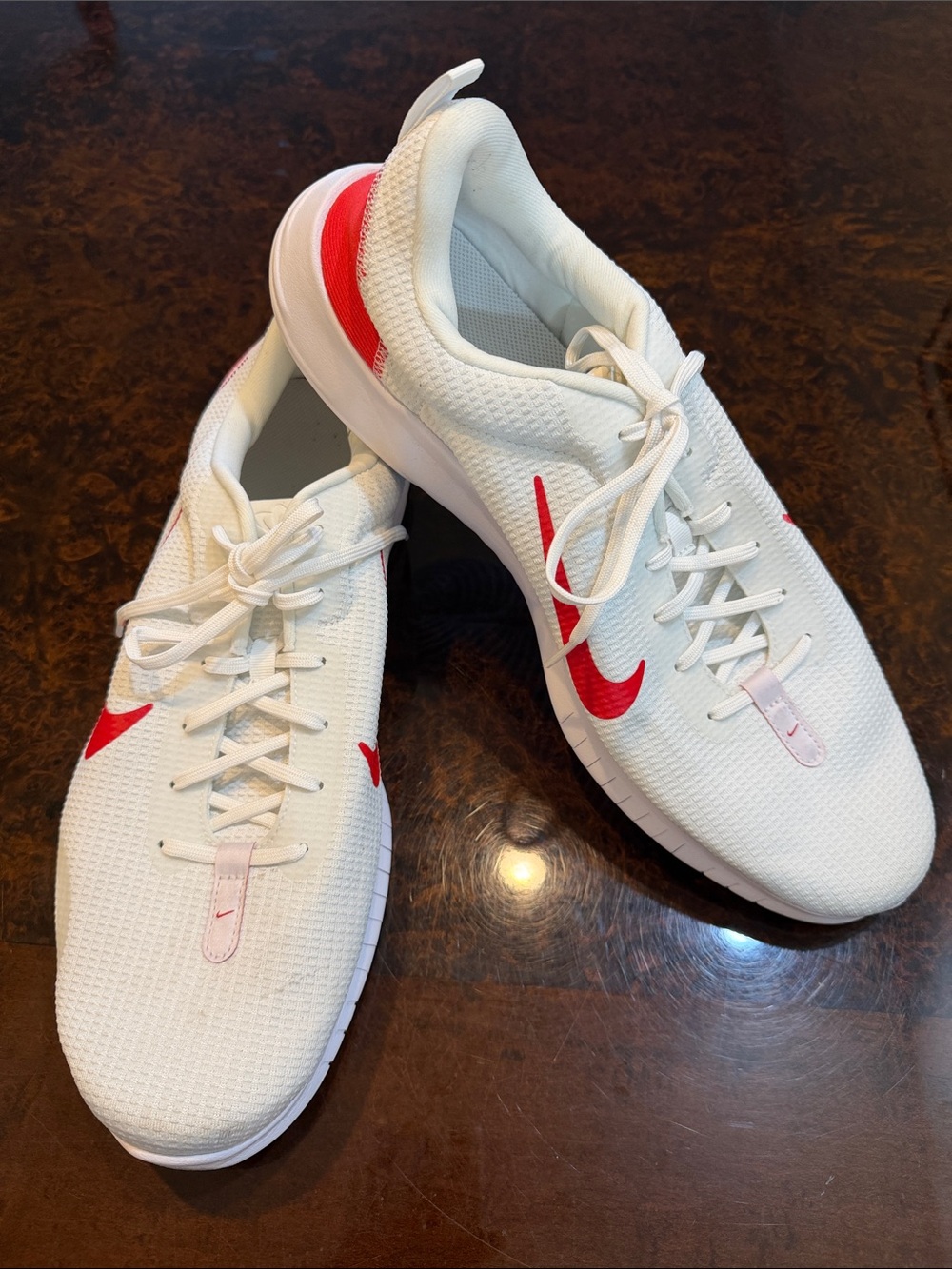 Nike White Athletic Sneakers with Red Swoosh